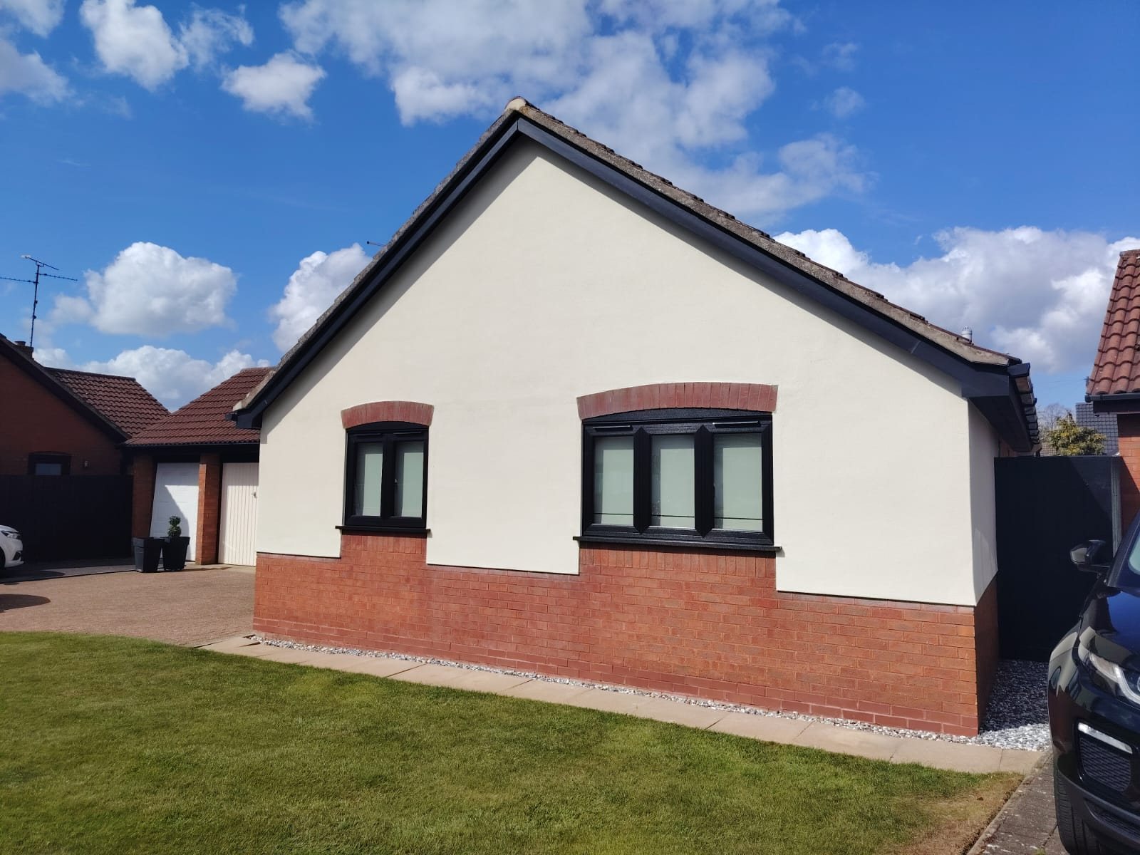 Pebbledash property finished with a smooth exterior wall coating